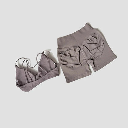 Women’s 2-Piece Gym Set – Strappy Twist Sports Bra & Cross Waist Ruched Shorts