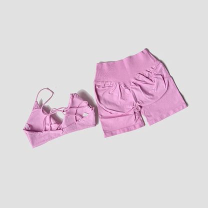 Women’s 2-Piece Gym Set – Strappy Twist Sports Bra & Cross Waist Ruched Shorts